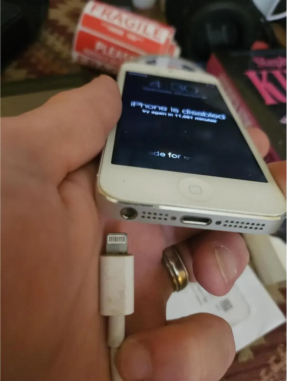 Apple iPhone 5 (i think) - White- charges and powers on. Working.